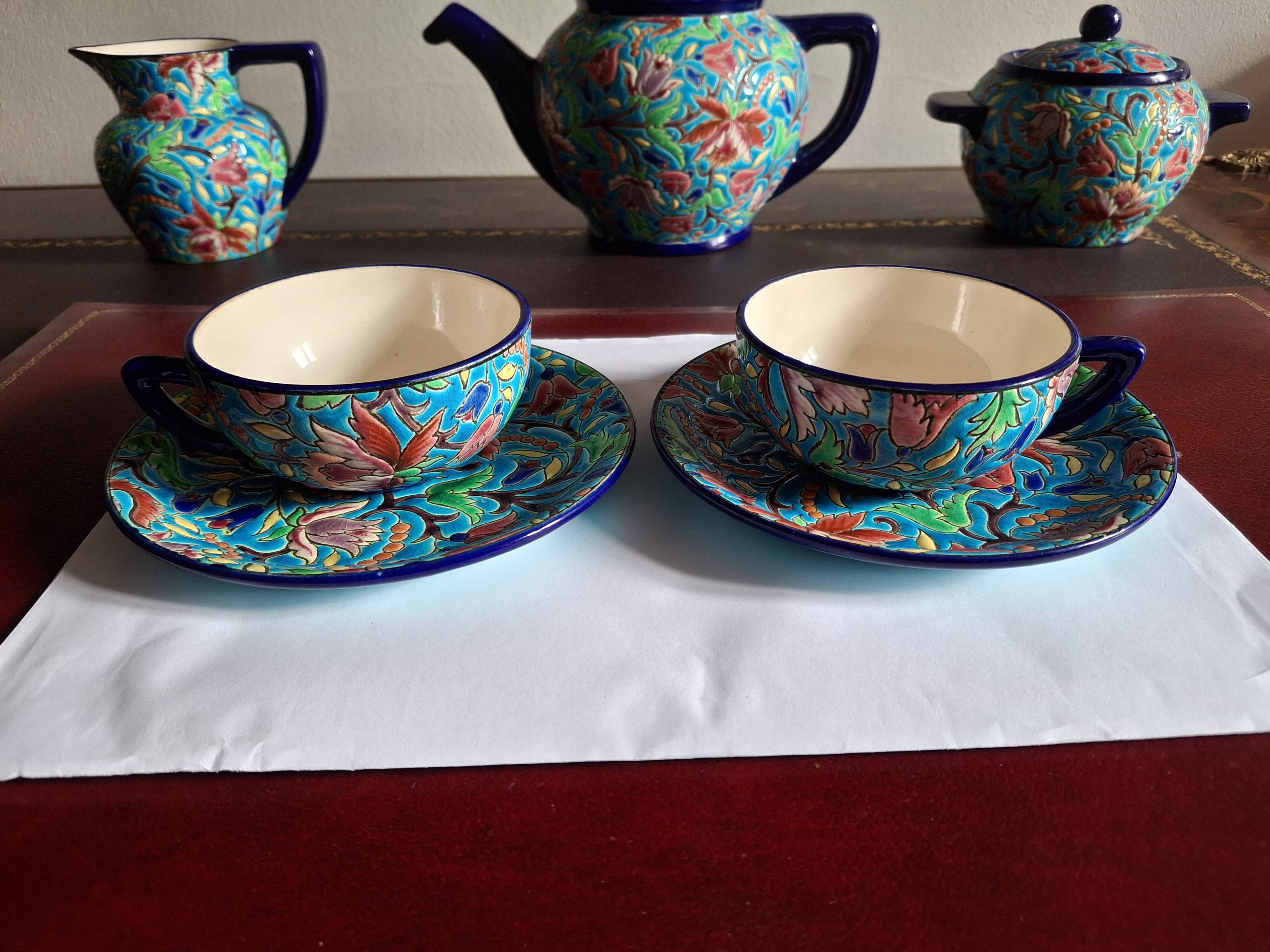 Cloisonné enamel tea service from Longwy in excellent condition.