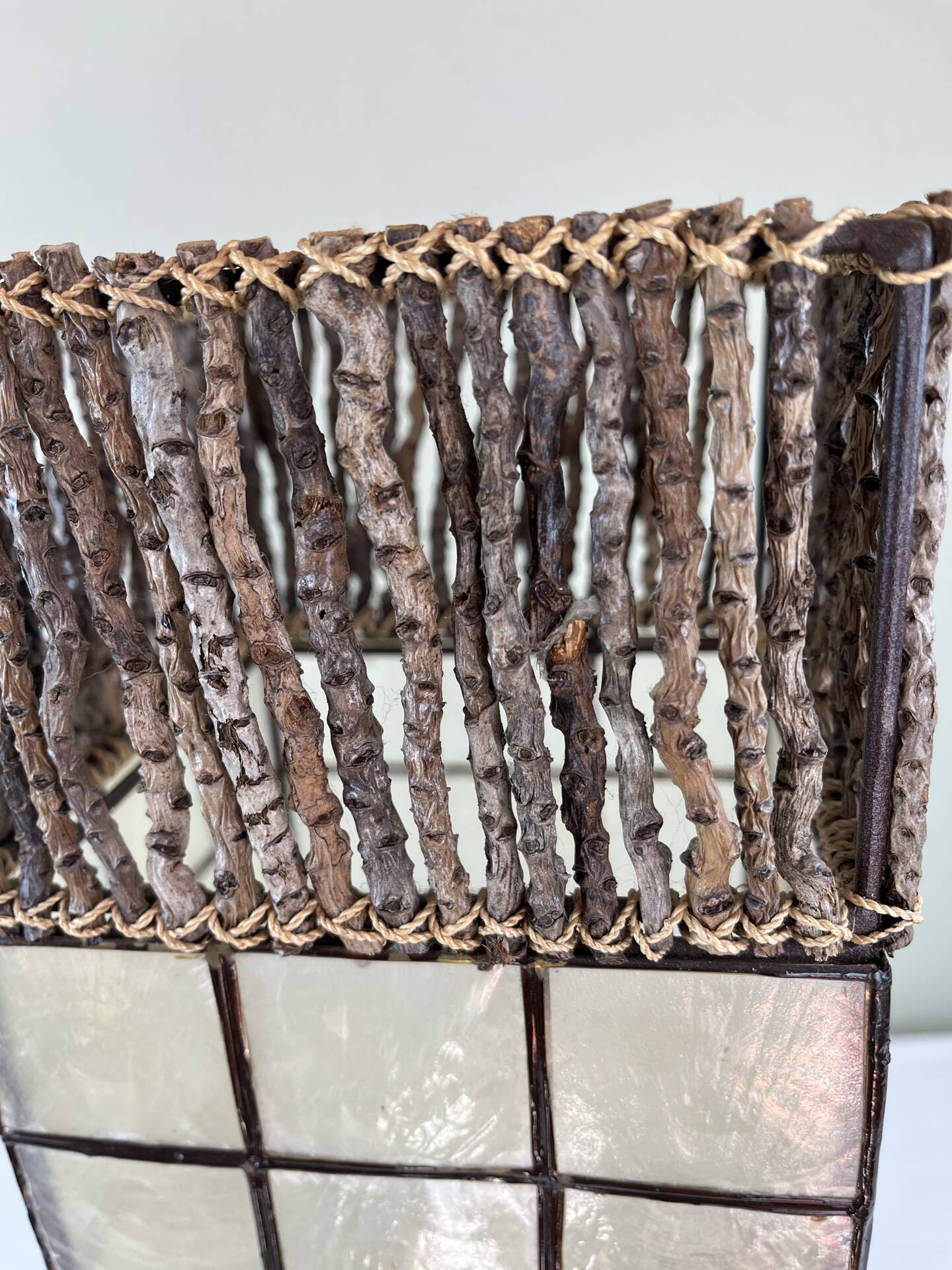 Capiz shell lamp and woven twigs