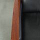 Electrically adjustable Art Deco design recliner with black cowhide leather