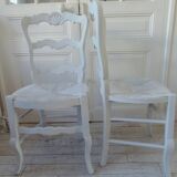 Duo of country-style chairs re-enchanted in pearl gray.