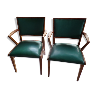 2 Old wooden chairs and adult in green skaï