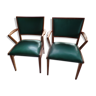 2 Old wooden chairs and adult in green skaï