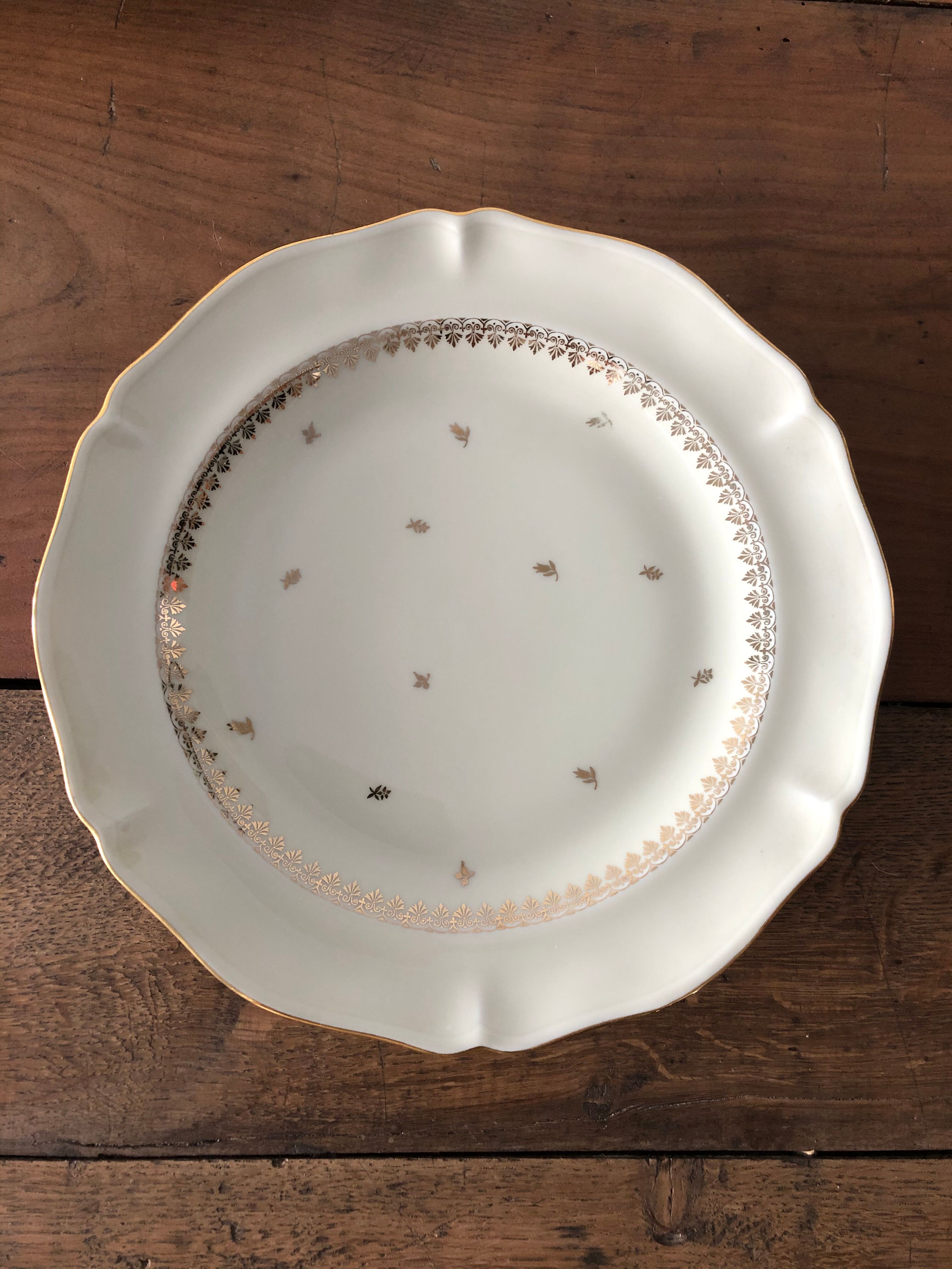 Service of 8 flat plates, Limoges