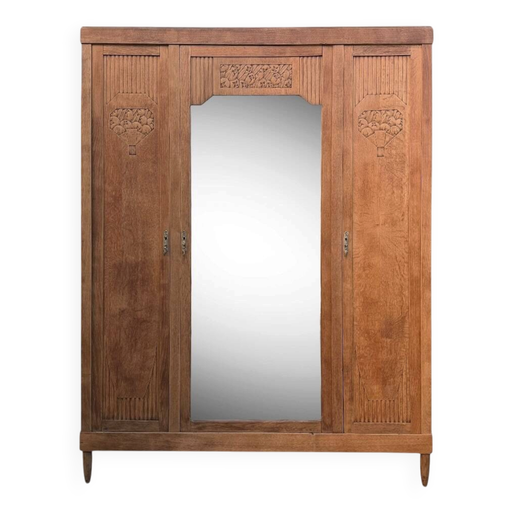 Art deco wardrobe in raw oak with bevelled mirror.