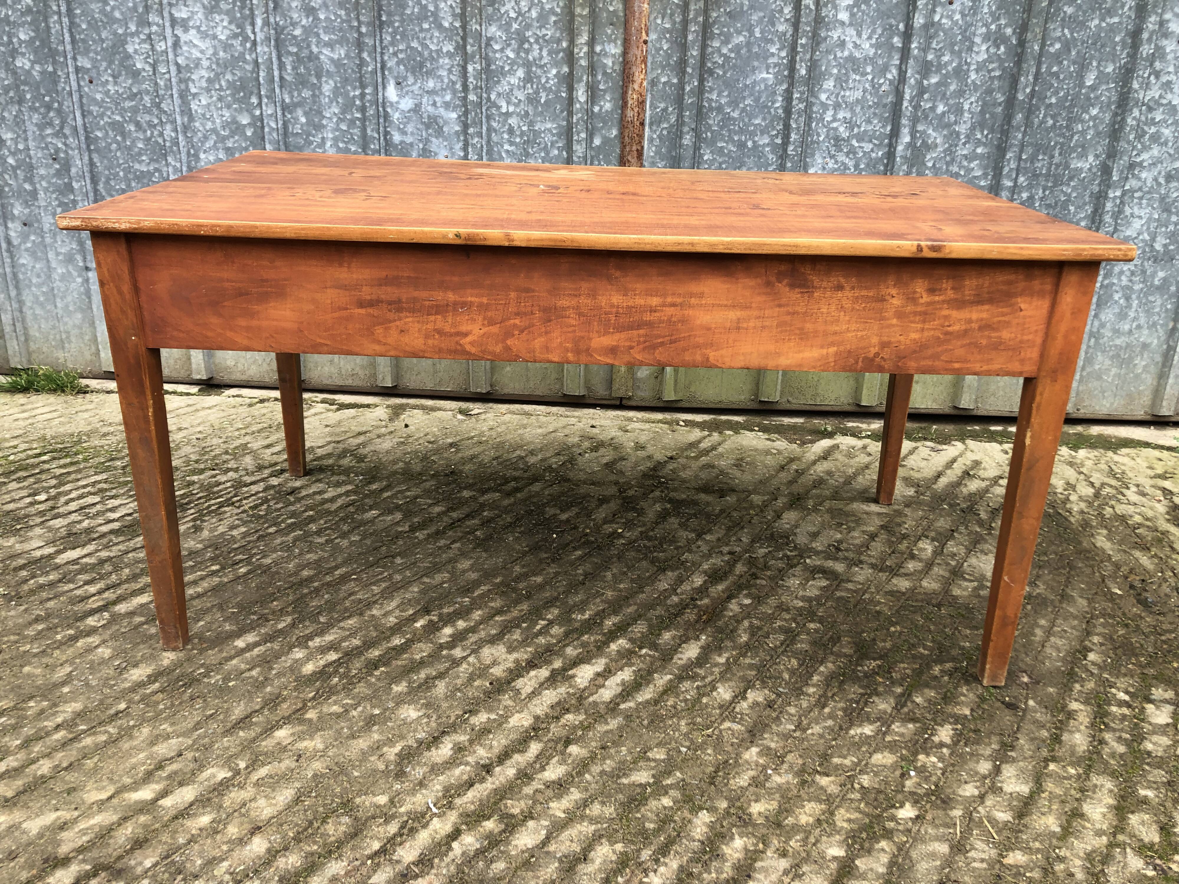 Poplar wood table with 2 front drawers from the Reconstruction period.