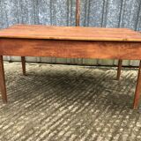 Poplar wood table with 2 front drawers from the Reconstruction period.