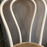 Couple of white bistro chairs