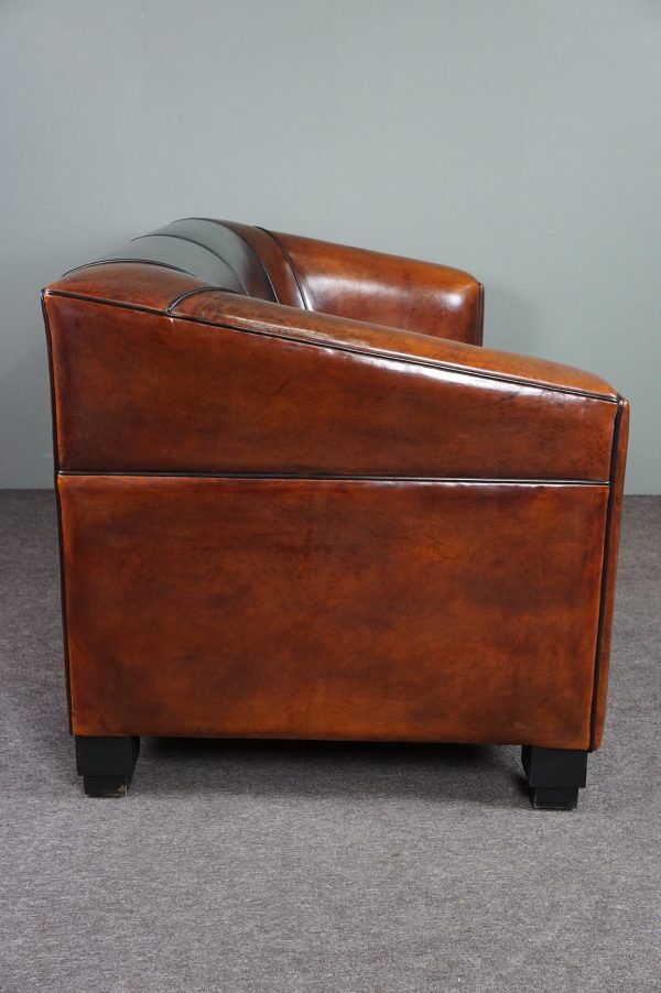2.5-seater art deco style sofa in sheepskin