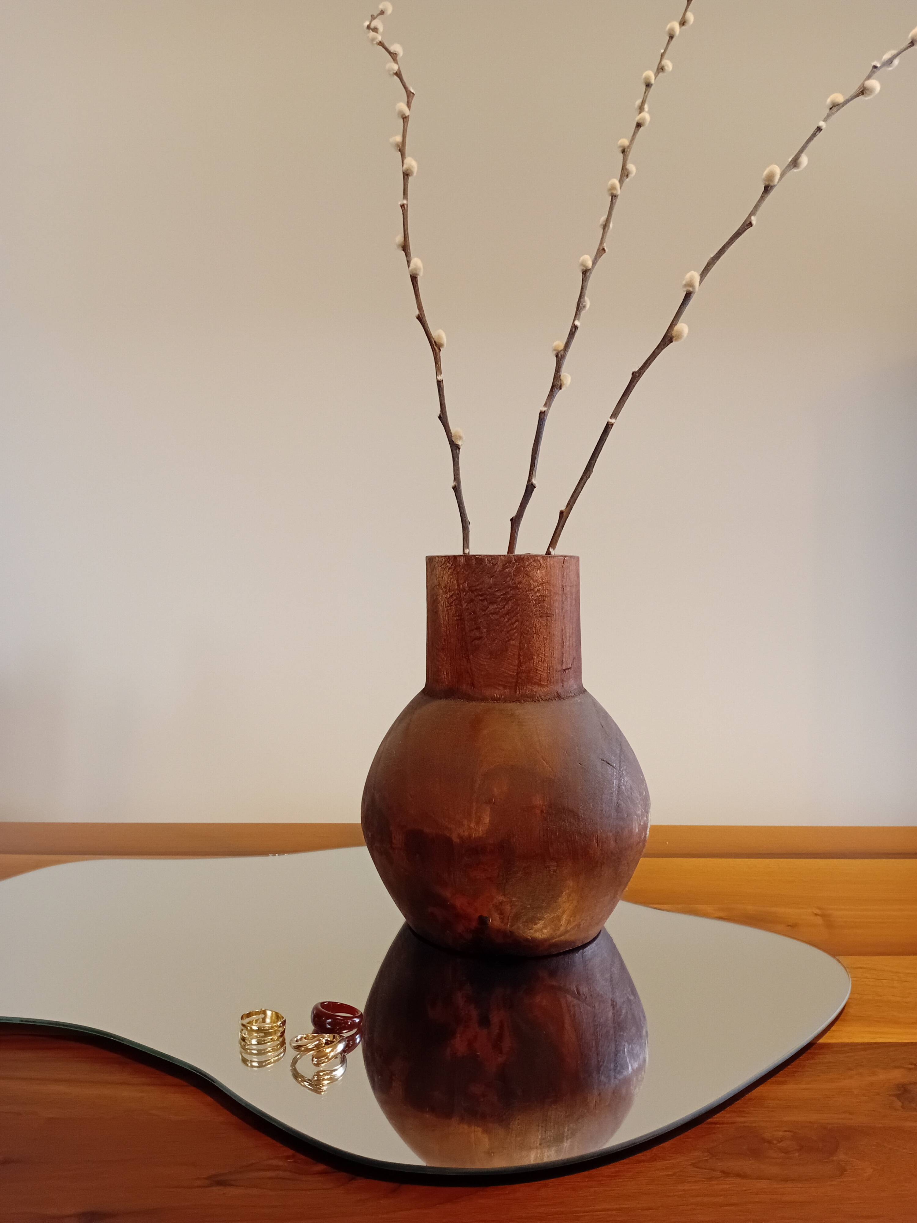 Carved wooden vase