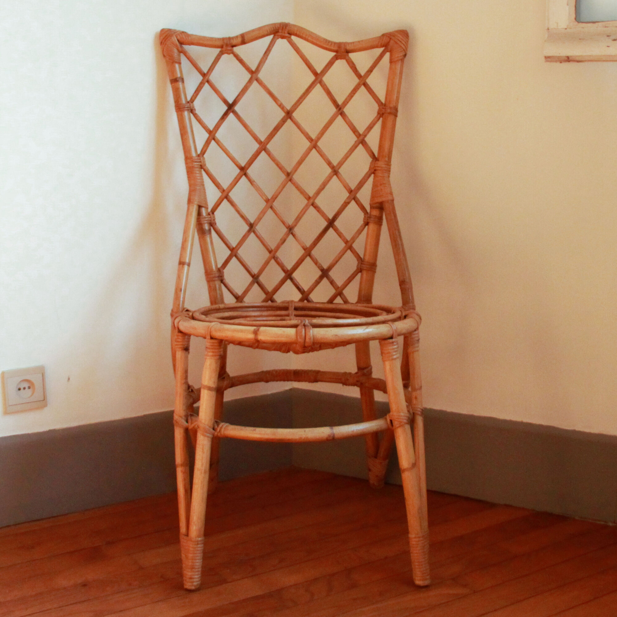 Trio of chairs in rattan Louis Sognot 50 60