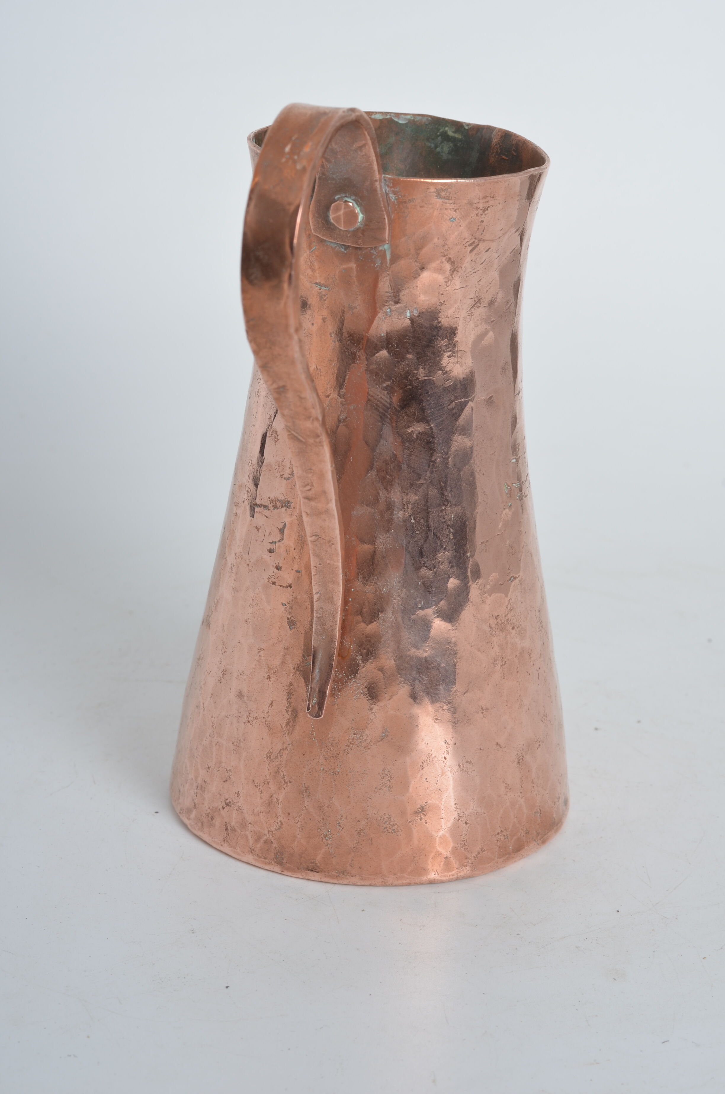 Hammered pink copper pitcher