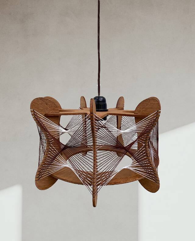 Hanging wood and stretched wire