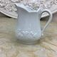 Small white porcelain milk jug