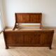 Double bed 160 cm in solid walnut with electric mattress base.