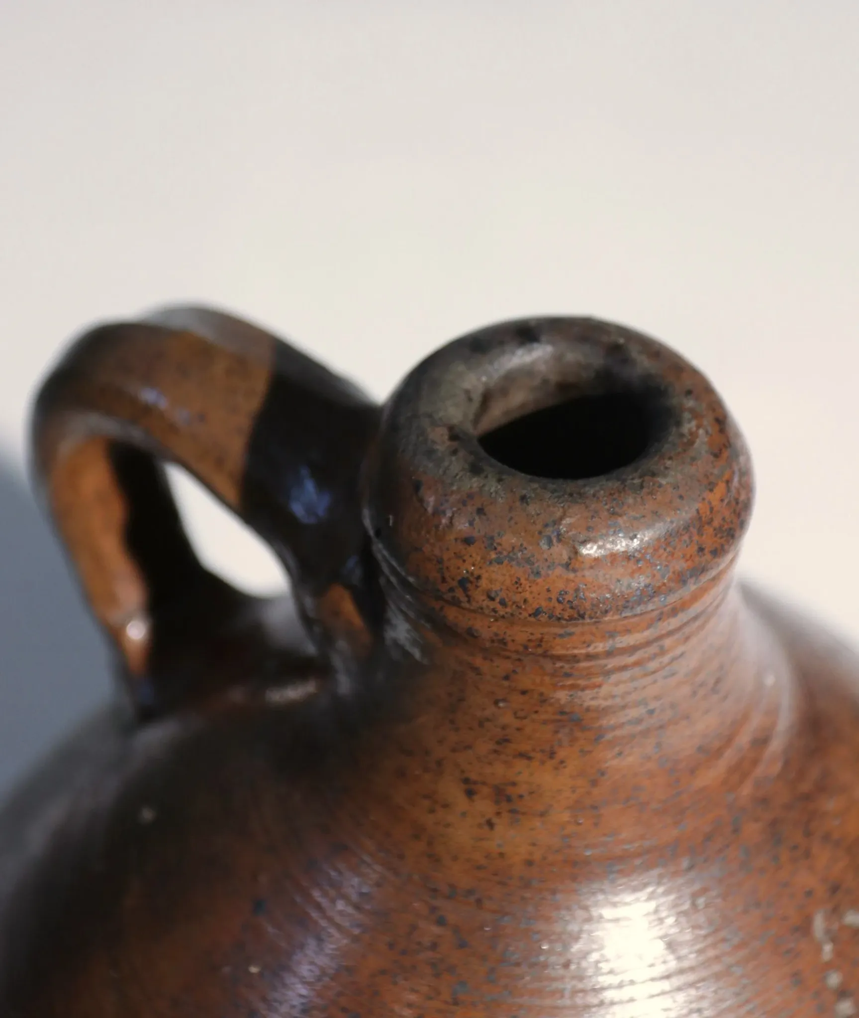 Brown stoneware jug with handle – 19th century