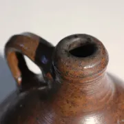 Brown stoneware jug with handle – 19th century