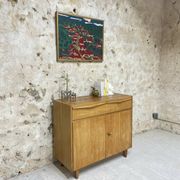 Peinture le village aux toits rouge