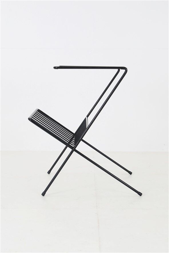 Filigree mid-century modern side table with magazine rack / steel / glass / 1960s