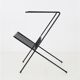 Filigree mid-century modern side table with magazine rack / steel / glass / 1960s