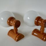 Pair of globe wall lights in pine and opaline from the 60s