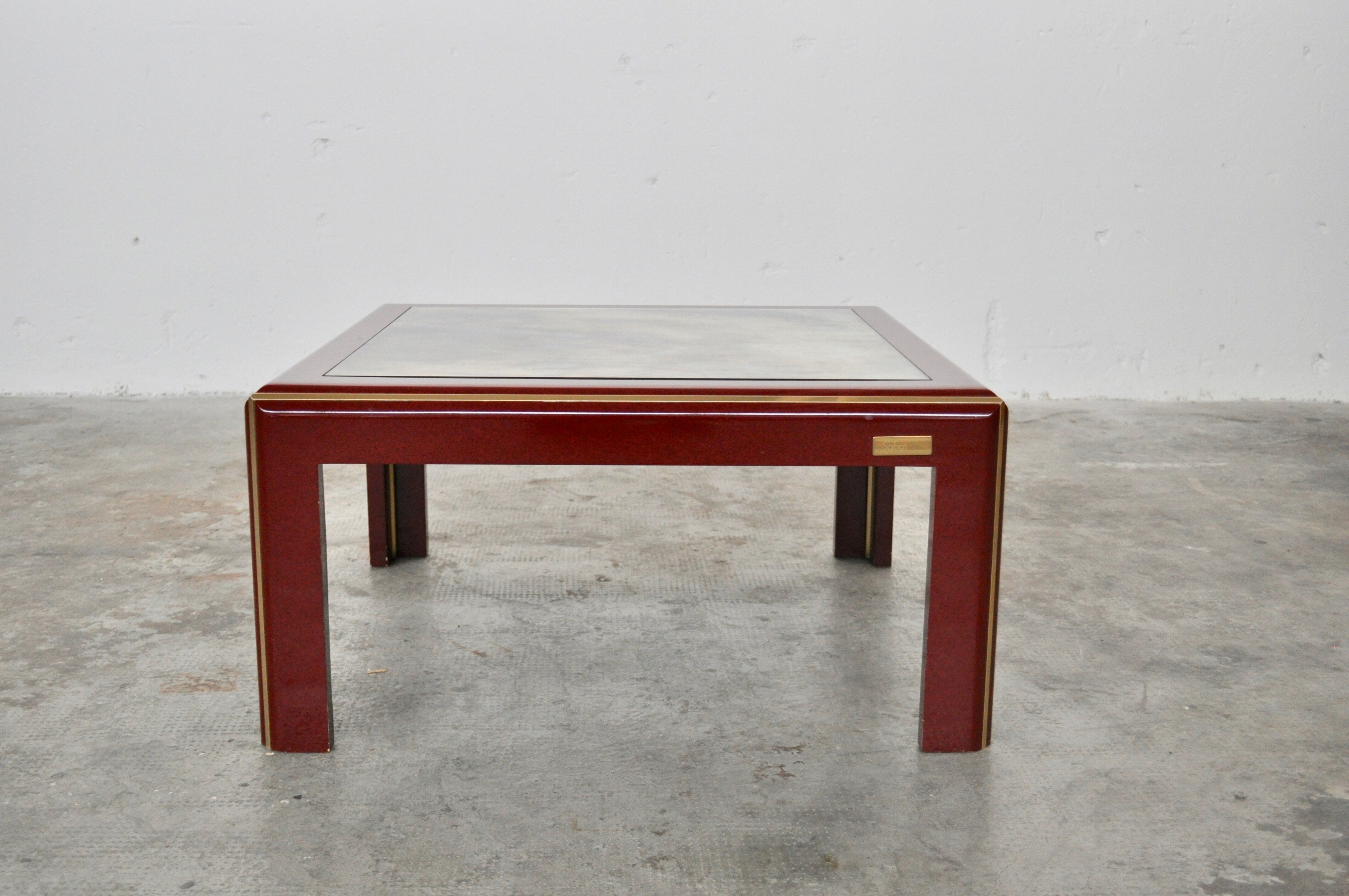 Vintage italian lacquered coffee table with mirror top & brass details from mario sabot