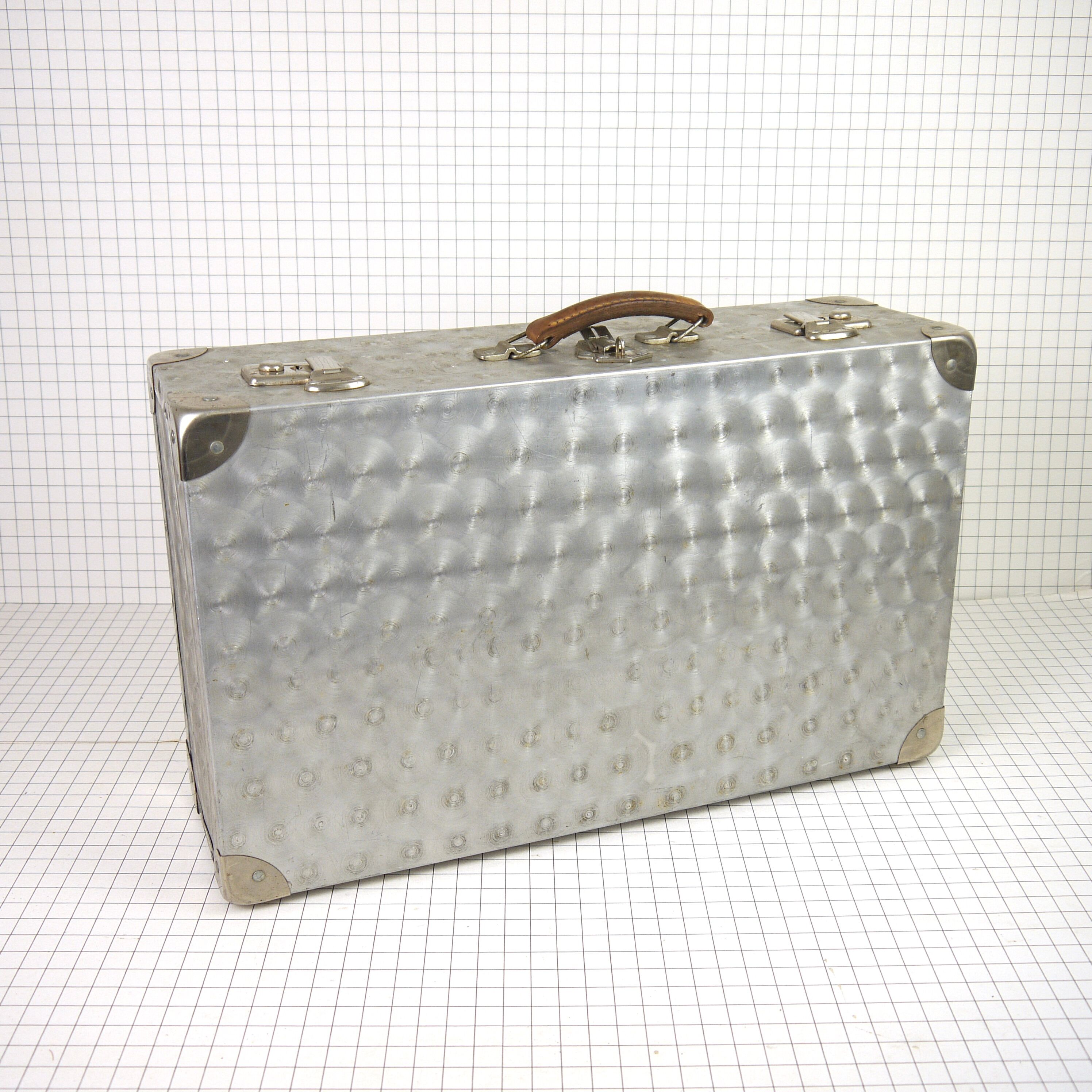 Metal case and leather handle