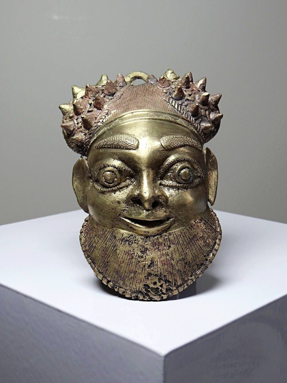 Small gilded bronze Oba mask from Bamoun, Cameroon, vintage Africa