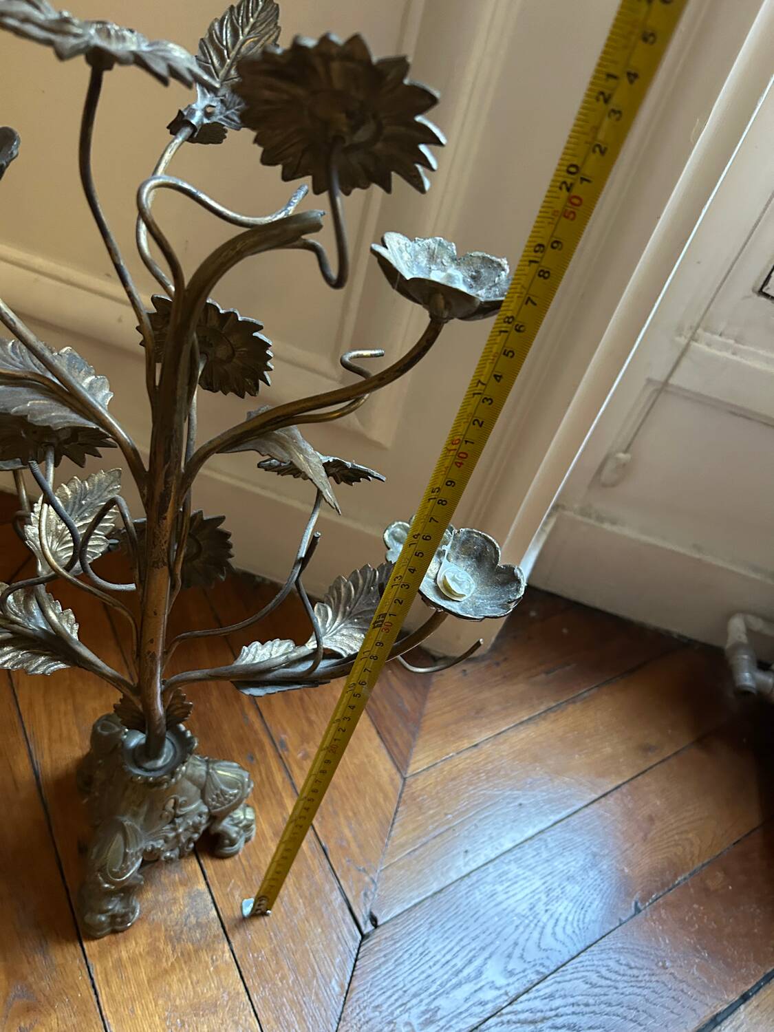 Antique metal candlestick with floral decoration – Mexico