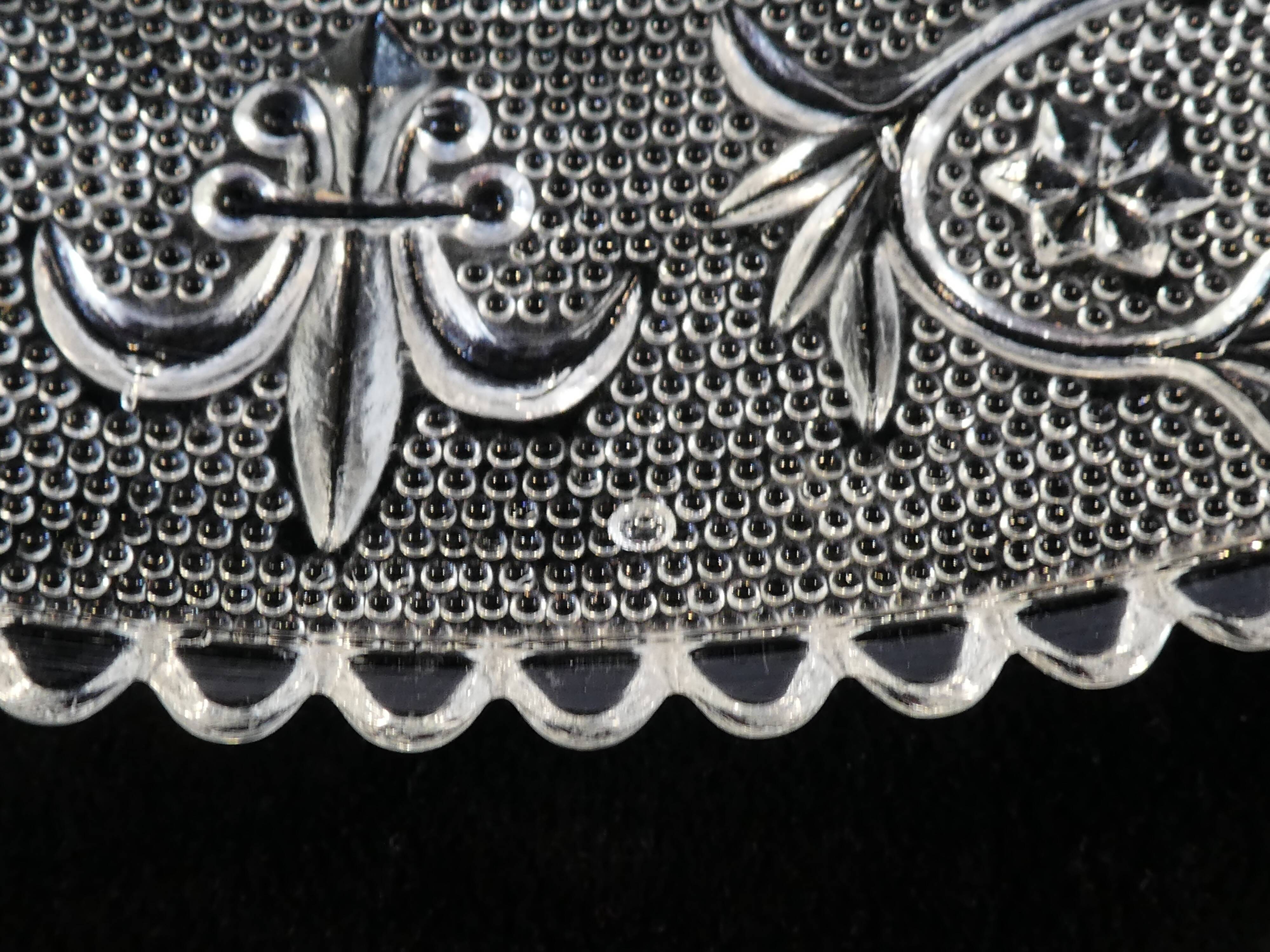 Old plate with pressed glass arabesque pie