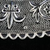 Old plate with pressed glass arabesque pie