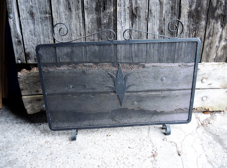 Old wrought iron chimney firewall