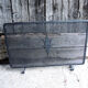 Old wrought iron chimney firewall