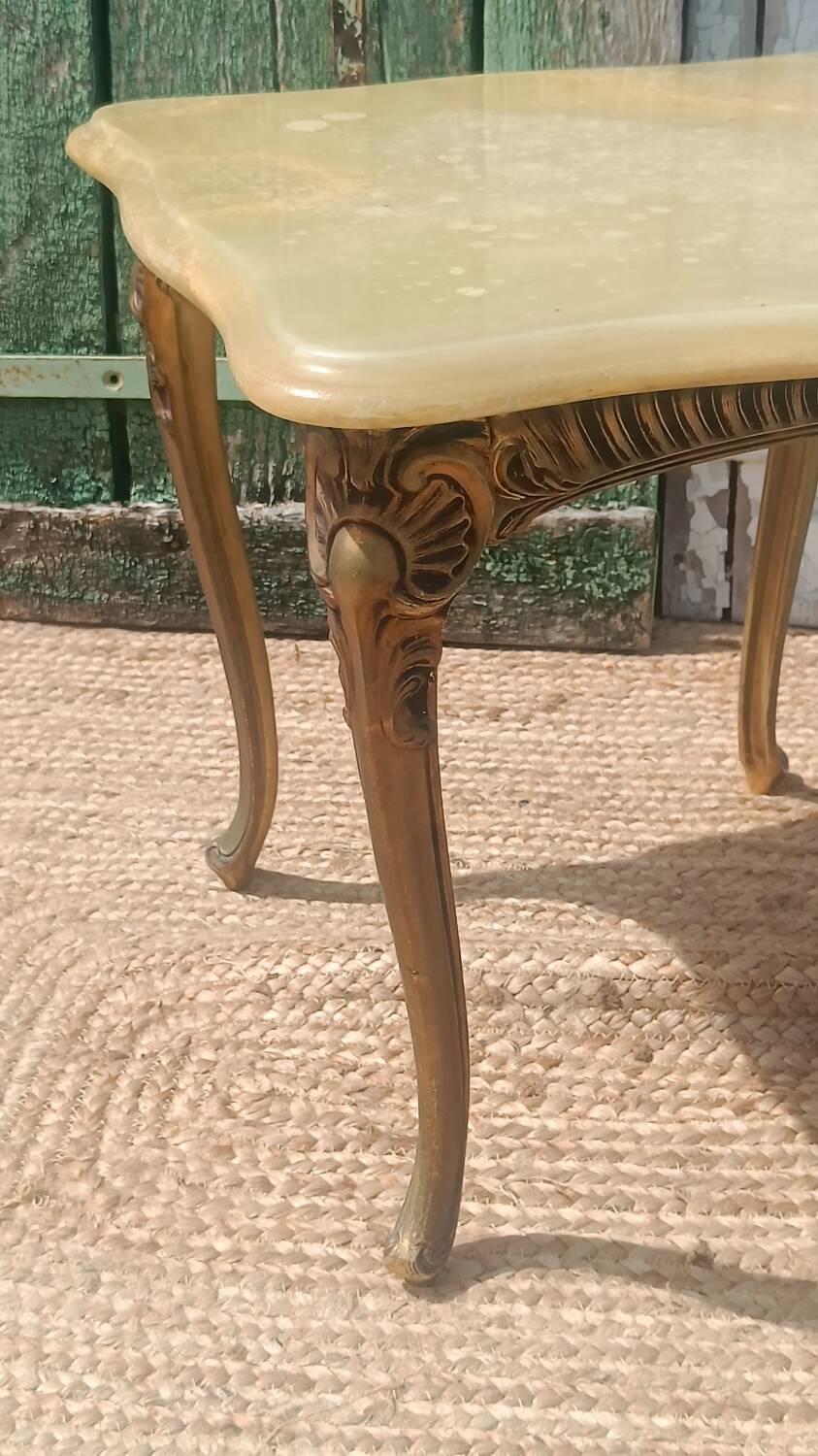 Vintage side table in gilded brass with an onyx top.