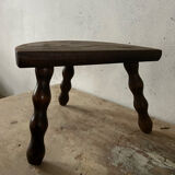 Wooden tripod farm stool