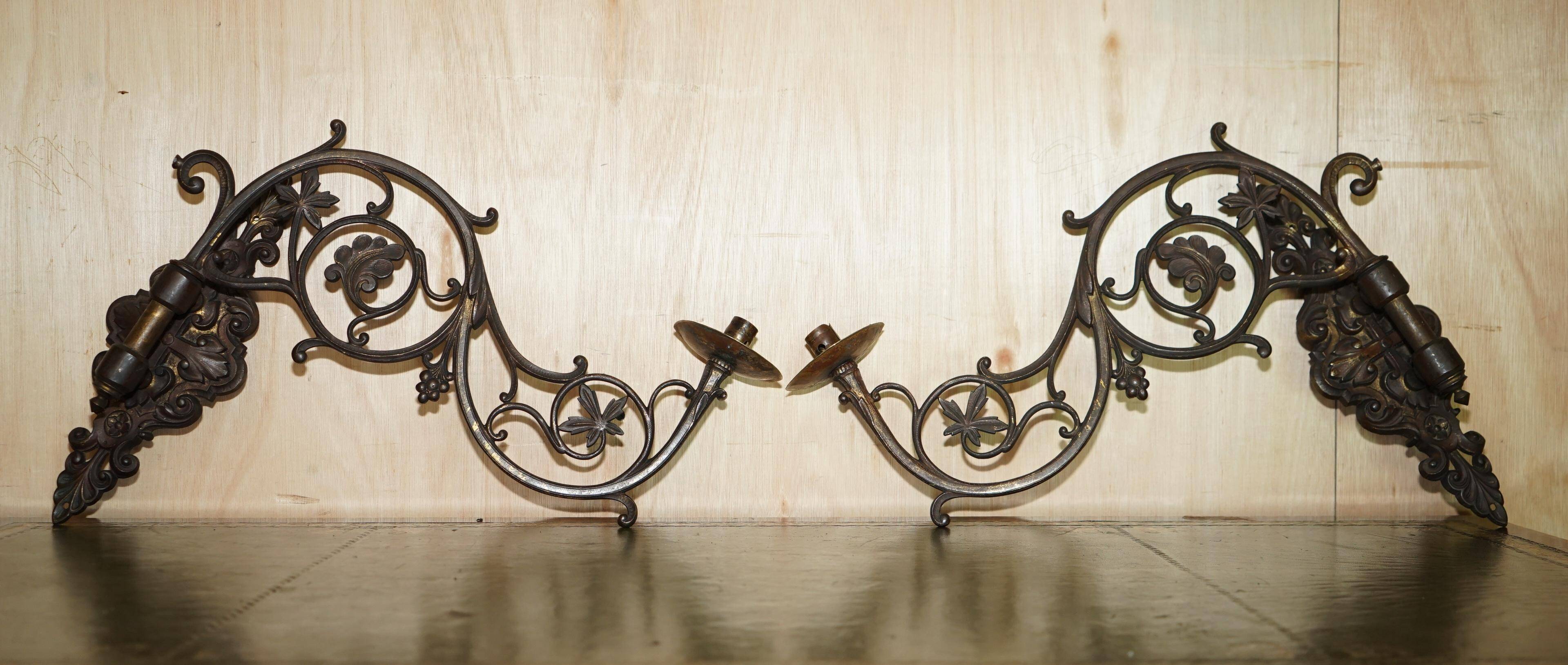 Pair of antique wall sconces in gilded bronze.