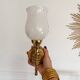 Set of 2 golden, bronze and brass torch wall lights