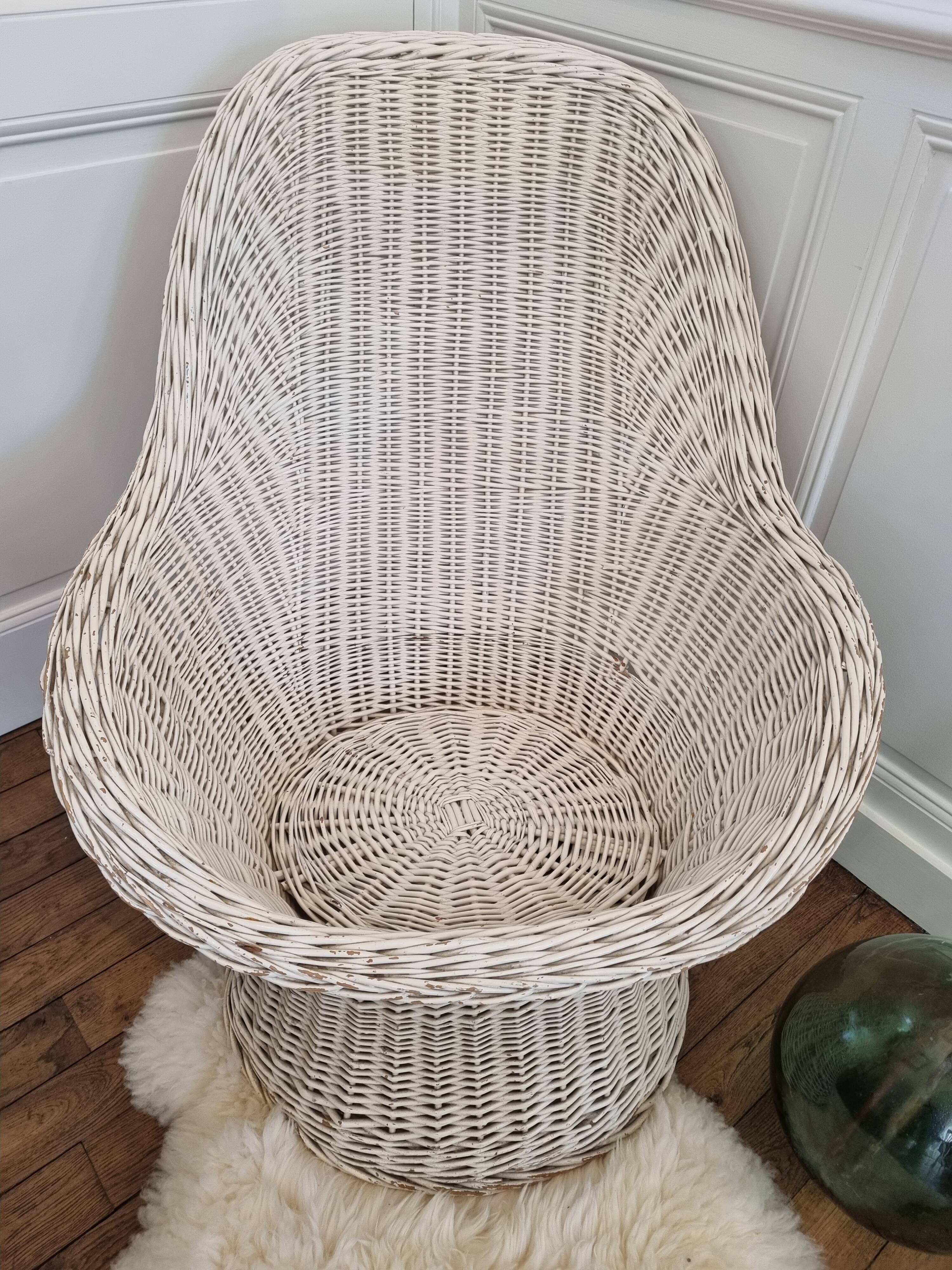 Vintage white rattan armchair