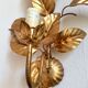 Apply gold metal sheets, Hans Kolg