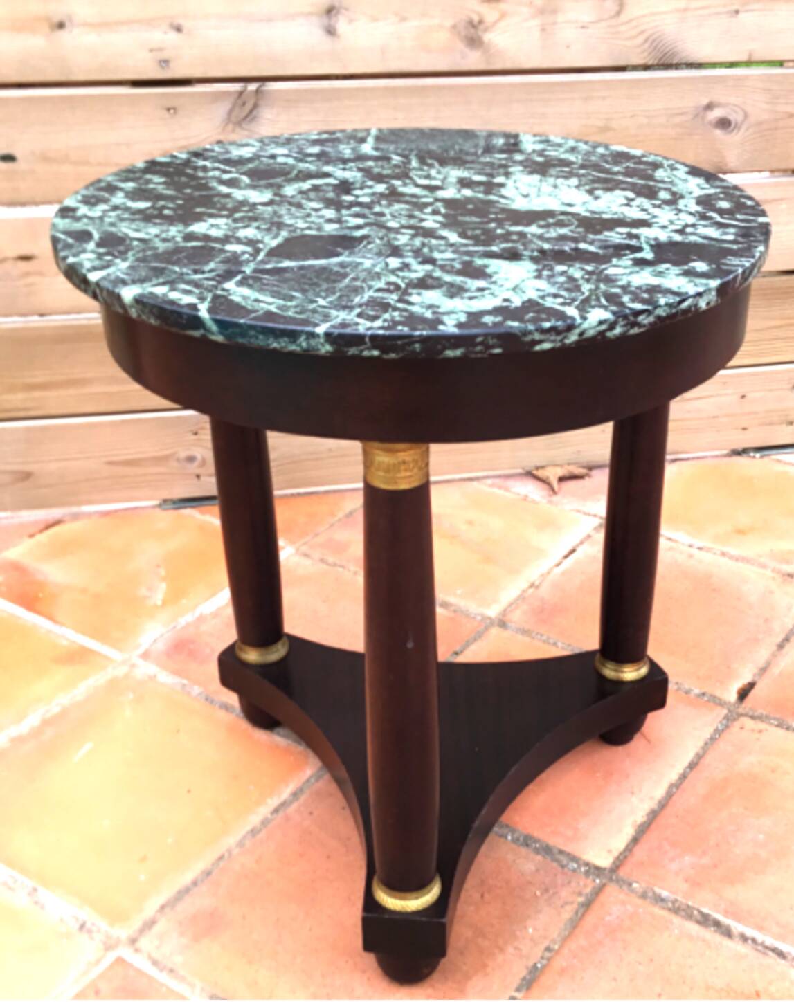 Empire period tripod pedestal table with sea green marble top and bronze ornamentation
