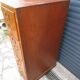 Antique oak filing cabinet with 4 drawers.