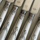 8 silver-plated metal knives, engraved handles with refined details.