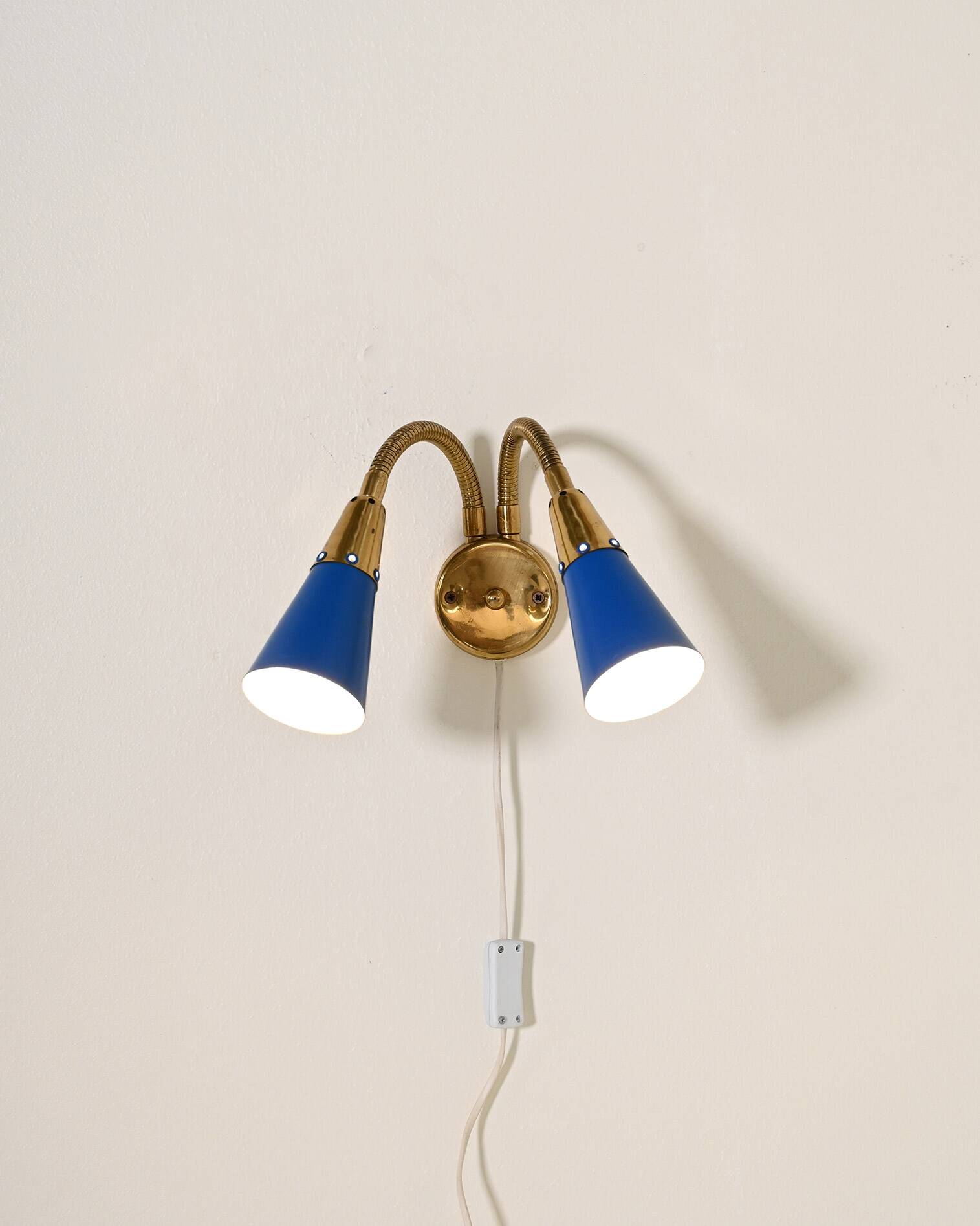 Adjustable brass and lacquered metal wall lamp, Scandinavia, 1960s