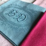 Suite of four antique tinted napkins
