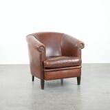Cognac-coloured cow leather club armchair in English style
