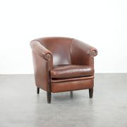 Cognac-coloured cow leather club armchair in English style