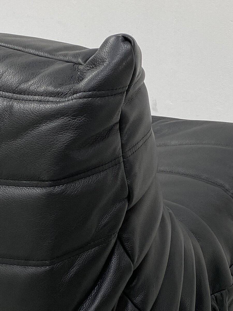 Set of French Togo lounge chair and ottoman in black leather attributed to Michel Ducaroy for Ligne Roset, 1970s
