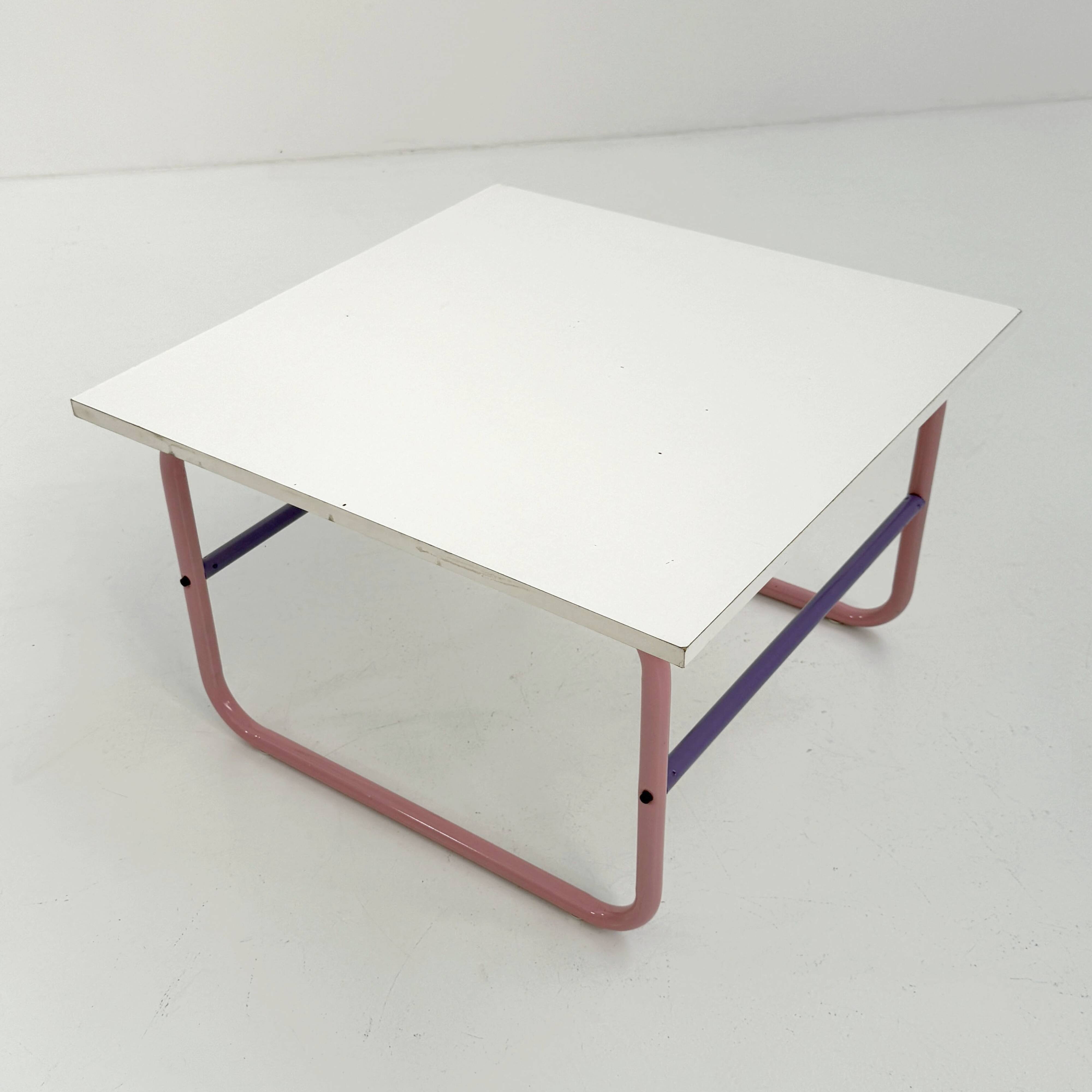 Pink and mauve tubular coffee table, 1980