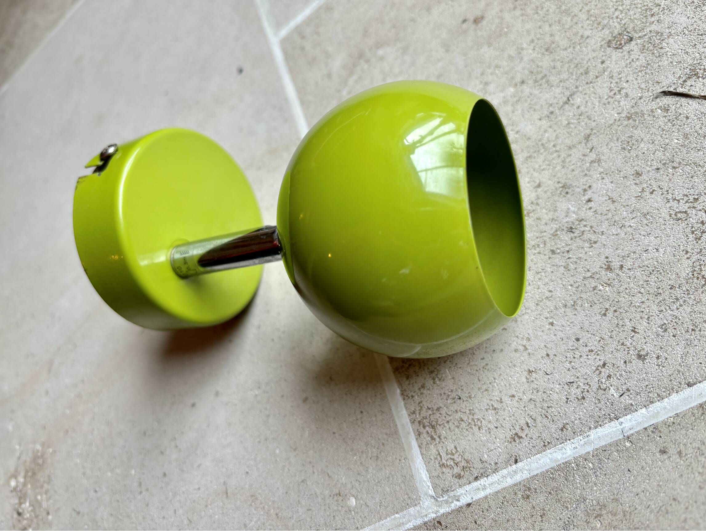 Small vintage metal spotlight in anis green/khaki color.