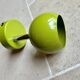 Small vintage metal spotlight in anis green/khaki color.
