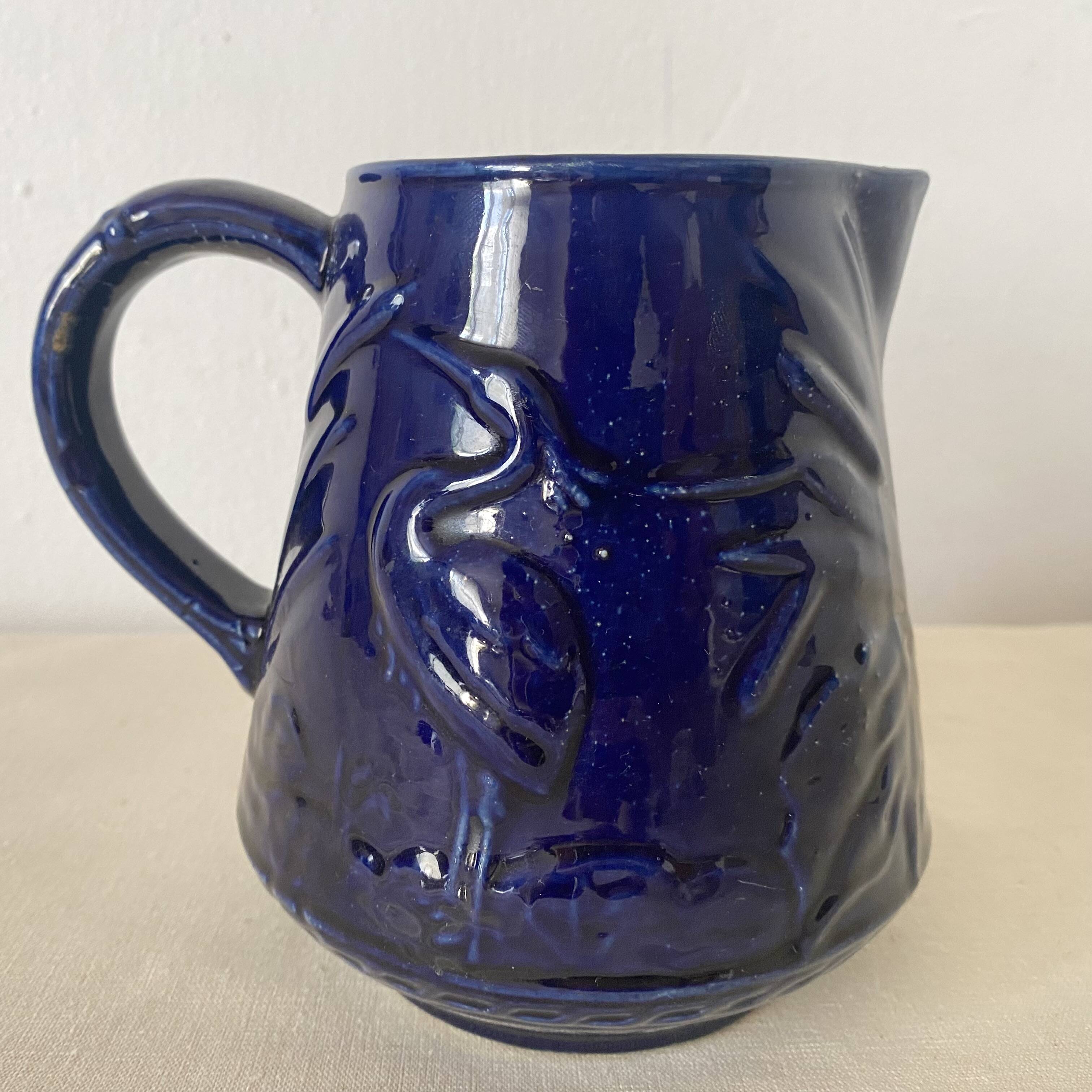 Heron slip jug made in England